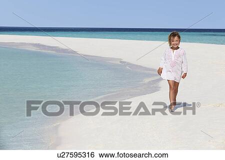 Girl Walking On Beautiful Tropical Beach View Large Photo Image Stock Photograph - Girl Walking On Beautiful Tropical Beach. Fotosearch