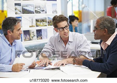 Group Of Men Meeting In Creative Office View Large Photo Image Stock Image - Group Of Men Meeting In Creative Office. Fotosearch