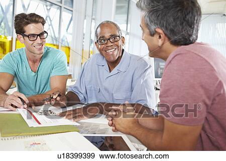 Group Of Men Meeting In Creative Office View Large Photo Image Stock Photo - Group Of Men Meeting In Creative Office. Fotosearch