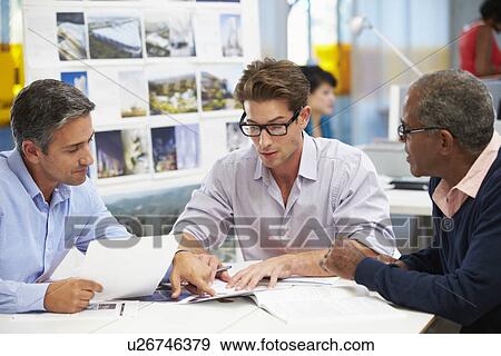 Group Of Men Meeting In Creative Office View Large Photo Image Stock Photo - Group Of Men Meeting In Creative Office. Fotosearch