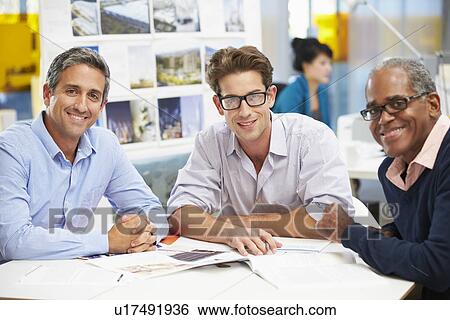 Group Of Men Meeting In Creative Office View Large Photo Image Stock Photograph - Group Of Men Meeting In Creative Office. Fotosearch