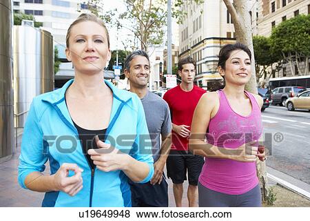 Stock Photo - Group Of Runners On Urban Street. Fotosearch