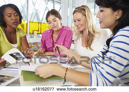 Group Of Women Meeting In Creative Office View Large Photo Image Stock Photo - Group Of Women Meeting In Creative Office. Fotosearch