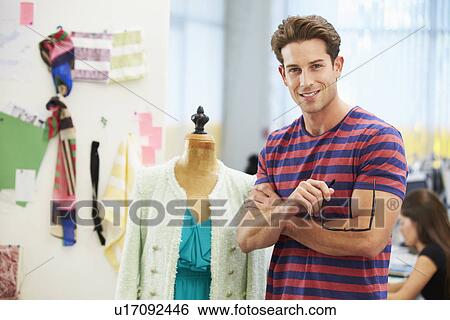 Stock Photograph - Male Fashion Designer In Studio . Fotosearch