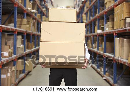 Man Carrying Boxes In Warehouse View Large Photo Image Stock Image - Man Carrying Boxes In Warehouse . Fotosearch