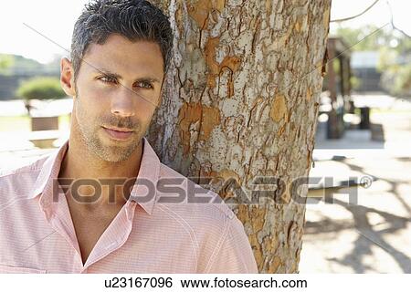 Man Relaxing In Park View Large Photo Image Stock Photograph - Man Relaxing In Park. Fotosearch