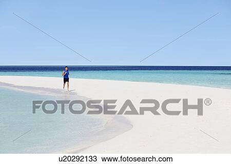 Man Running On Beautiful Beach View Large Photo Image Stock Image - Man Running On Beautiful Beach. Fotosearch
