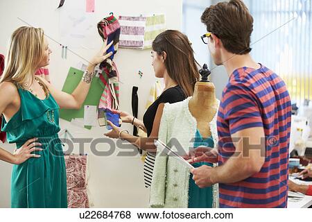 Meeting In Fashion Design Studio View Large Photo Image Stock Photo - Meeting In Fashion Design Studio . Fotosearch