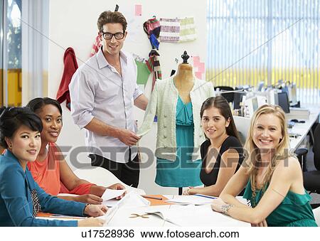 Meeting In Fashion Design Studio View Large Photo Image Stock Photograph - Meeting In Fashion Design Studio . Fotosearch