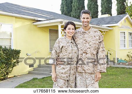 Military Couple In Uniform Standing Outside House View Large Photo Image Stock Photography - Military Couple In Uniform Standing Outside House. Fotosearch