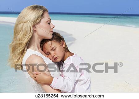 Mother And Daughter Hugging On Beautiful Beach View Large Photo Image Picture - Mother And Daughter Hugging On Beautiful Beach . Fotosearch