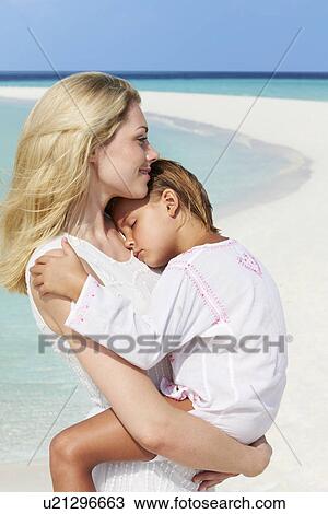 Mother And Daughter Hugging On Beautiful Beach View Large Photo Image Stock Image - Mother And Daughter Hugging On Beautiful Beach . Fotosearch
