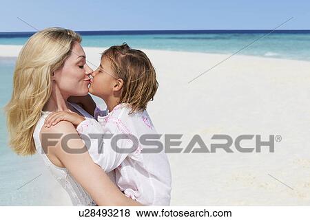Mother And Daughter Hugging On Beautiful Beach View Large Photo Image Stock Photo - Mother And Daughter Hugging On Beautiful Beach . Fotosearch