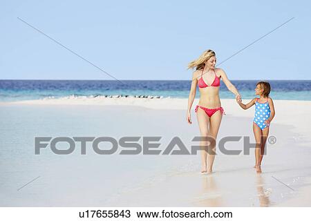 Mother And Daughter Walking On Beautiful Beach View Large Photo Image Stock Image - Mother And Daughter Walking On Beautiful Beach . Fotosearch