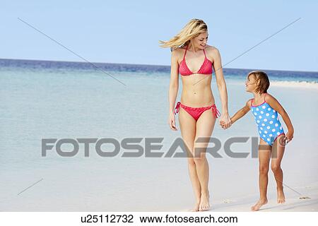 Mother And Daughter Walking On Beautiful Beach View Large Photo Image Stock Image - Mother And Daughter Walking On Beautiful Beach . Fotosearch