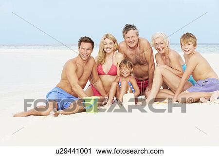 Multi Generation Family Having Fun On Beach Holiday View Large Photo Image Stock Image - Multi Generation Family Having Fun On Beach Holiday. Fotosearch