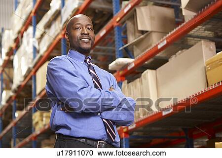 Portrait Of Businessman In Warehouse View Large Photo Image Stock Image - Portrait Of Businessman In Warehouse. Fotosearch