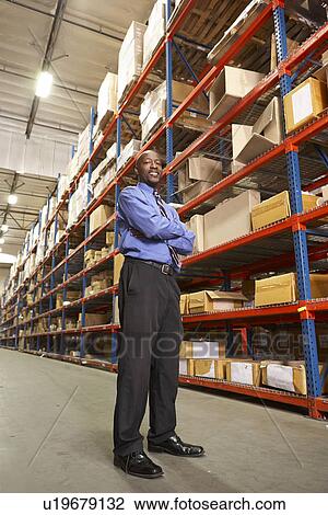 Portrait Of Businessman In Warehouse View Large Photo Image Stock Image - Portrait Of Businessman In Warehouse. Fotosearch
