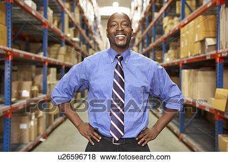 Portrait Of Businessman In Warehouse View Large Photo Image Stock Photo - Portrait Of Businessman In Warehouse. Fotosearch