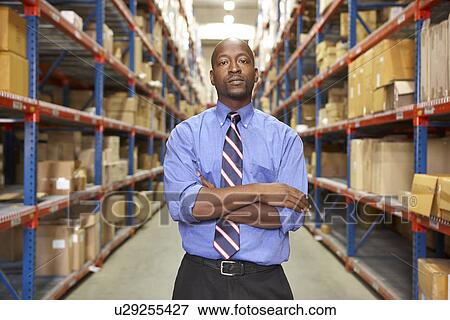 Portrait Of Businessman In Warehouse View Large Photo Image Stock Photo - Portrait Of Businessman In Warehouse. Fotosearch