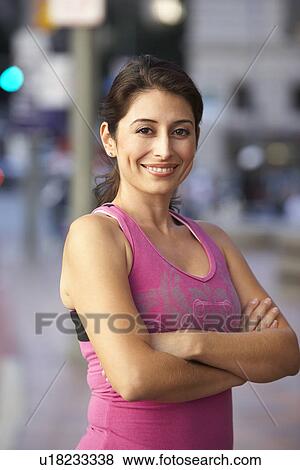 Portrait Of Female Runner On Urban Street View Large Photo Image Stock Photo - Portrait Of Female Runner On Urban Street. Fotosearch