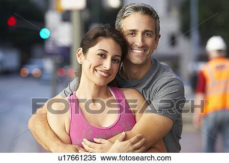 Portrait Of Male And Female Runners On Urban Street View Large Photo Image Stock Photography - Portrait Of Male And Female Runners On Urban Street. Fotosearch