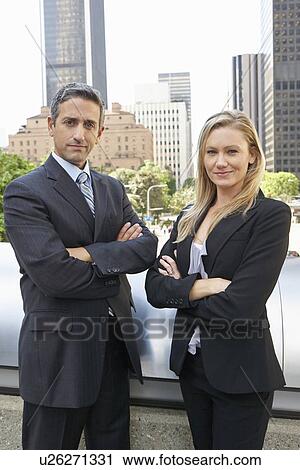 Stock Image - Portrait Of Two Business Colleagues Outside Office. Fotosearch