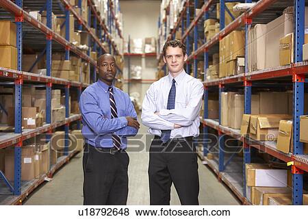 Portrait Of Two Businessmen In Warehouse View Large Photo Image Stock Photo - Portrait Of Two Businessmen In Warehouse. Fotosearch