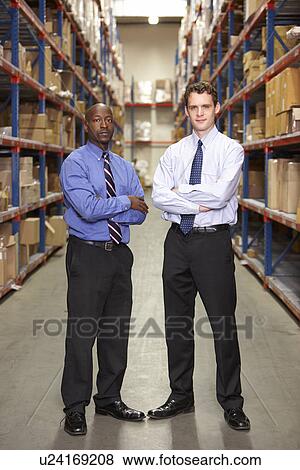 Portrait Of Two Businessmen In Warehouse View Large Photo Image Stock Photo - Portrait Of Two Businessmen In Warehouse. Fotosearch