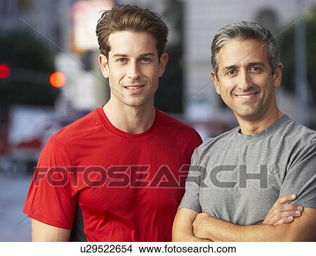 Portrait Of Two Male Runners On Urban Street View Large Photo Image Picture - Portrait Of Two Male Runners On Urban Street. Fotosearch