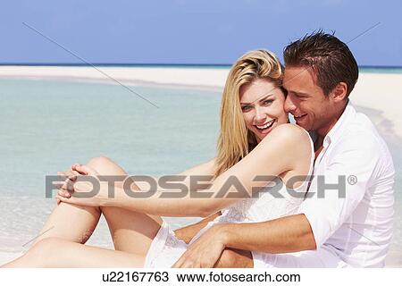 Romantic Couple Sitting On Beautiful Tropical Beach View Large Photo Image Stock Image - Romantic Couple Sitting On Beautiful Tropical Beach. Fotosearch