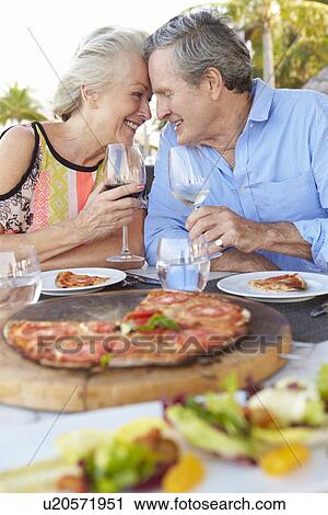 Senior Couple Enjoying Meal In Outdoor Restaurant View Large Photo Image Stock Image - Senior Couple Enjoying Meal In Outdoor Restaurant. Fotosearch