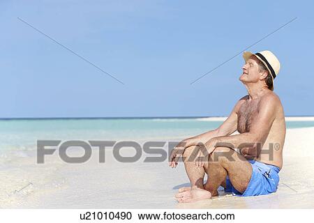 Senior Man Enjoying Beach Holiday View Large Photo Image Stock Image - Senior Man Enjoying Beach Holiday. Fotosearch