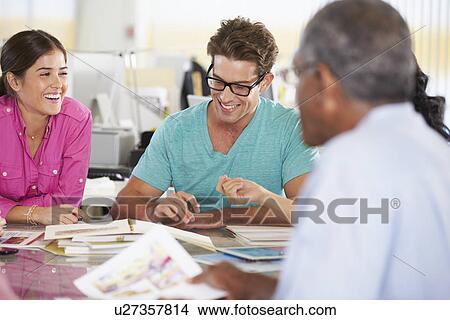 Picture - Team Meeting In Creative Office. Fotosearch