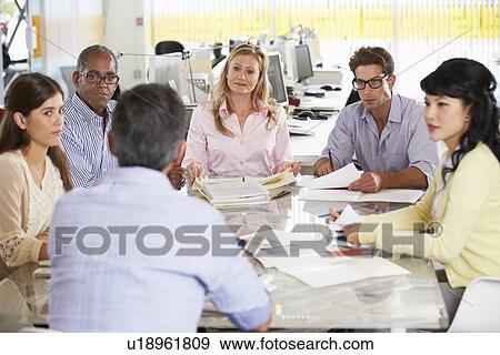 Team Meeting In Creative Office View Large Photo Image Stock Photo - Team Meeting In Creative Office. Fotosearch