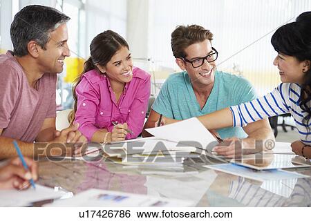 Team Meeting In Creative Office View Large Photo Image Stock Photograph - Team Meeting In Creative Office. Fotosearch