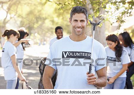 Team Of Volunteers Picking Up Litter In Suburban Street View Large Photo Image Stock Image - Team Of Volunteers Picking Up Litter In Suburban Street. Fotosearch