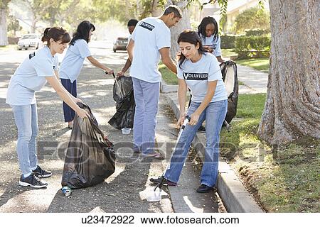 Team Of Volunteers Picking Up Litter In Suburban Street View Large Photo Image Stock Image - Team Of Volunteers Picking Up Litter In Suburban Street. Fotosearch