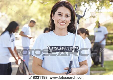 Team Of Volunteers Picking Up Litter In Suburban Street View Large Photo Image Stock Photo - Team Of Volunteers Picking Up Litter In Suburban Street. Fotosearch