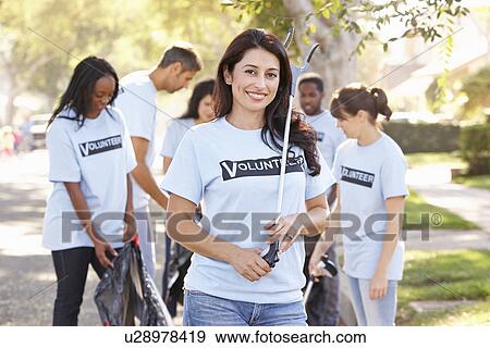 Team Of Volunteers Picking Up Litter In Suburban Street View Large Photo Image Stock Photo - Team Of Volunteers Picking Up Litter In Suburban Street. Fotosearch