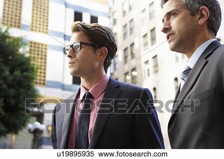 Two Businessman Chatting Outside Office View Large Photo Image Stock Photography - Two Businessman Chatting Outside Office. Fotosearch