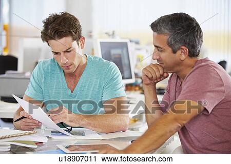 Two Men Meeting In Creative Office View Large Photo Image Stock Image - Two Men Meeting In Creative Office. Fotosearch