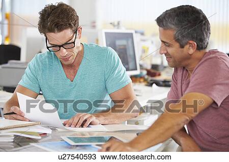 Two Men Meeting In Creative Office View Large Photo Image Stock Image - Two Men Meeting In Creative Office. Fotosearch