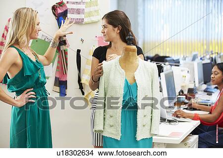 Picture - Two Women Meeting In Fashion Design Studio . Fotosearch
