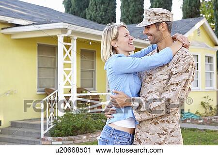 Wife Welcoming Husband Home On Army Leave View Large Photo Image Stock Image - Wife Welcoming Husband Home On Army Leave. Fotosearch