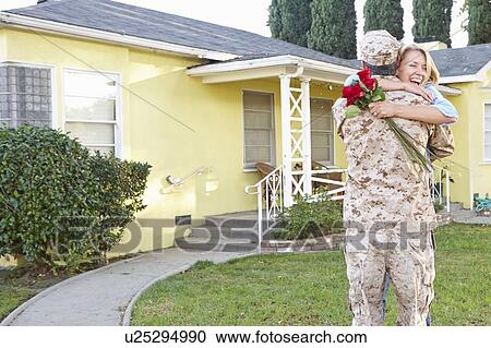 Wife Welcoming Husband Home On Army Leave View Large Photo Image Stock Image - Wife Welcoming Husband Home On Army Leave. Fotosearch