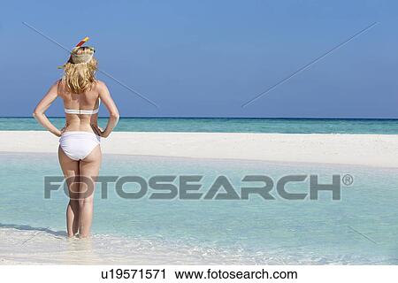 Woman Enjoying Beach Holiday View Large Photo Image Stock Image - Woman Enjoying Beach Holiday. Fotosearch