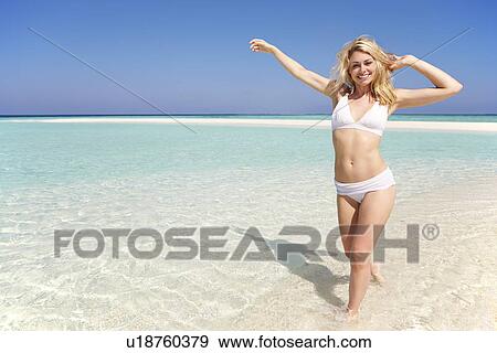 Woman Enjoying Beach Holiday View Large Photo Image Stock Photo - Woman Enjoying Beach Holiday. Fotosearch