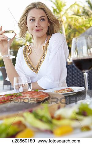 Woman Enjoying Meal In Outdoor Restaurant View Large Photo Image Stock Photo - Woman Enjoying Meal In Outdoor Restaurant. Fotosearch