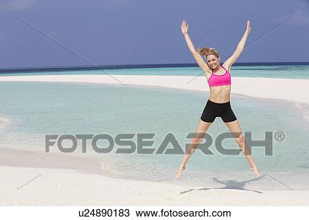 Woman Exercising On Beautiful Beach View Large Photo Image Stock Image - Woman Exercising On Beautiful Beach. Fotosearch